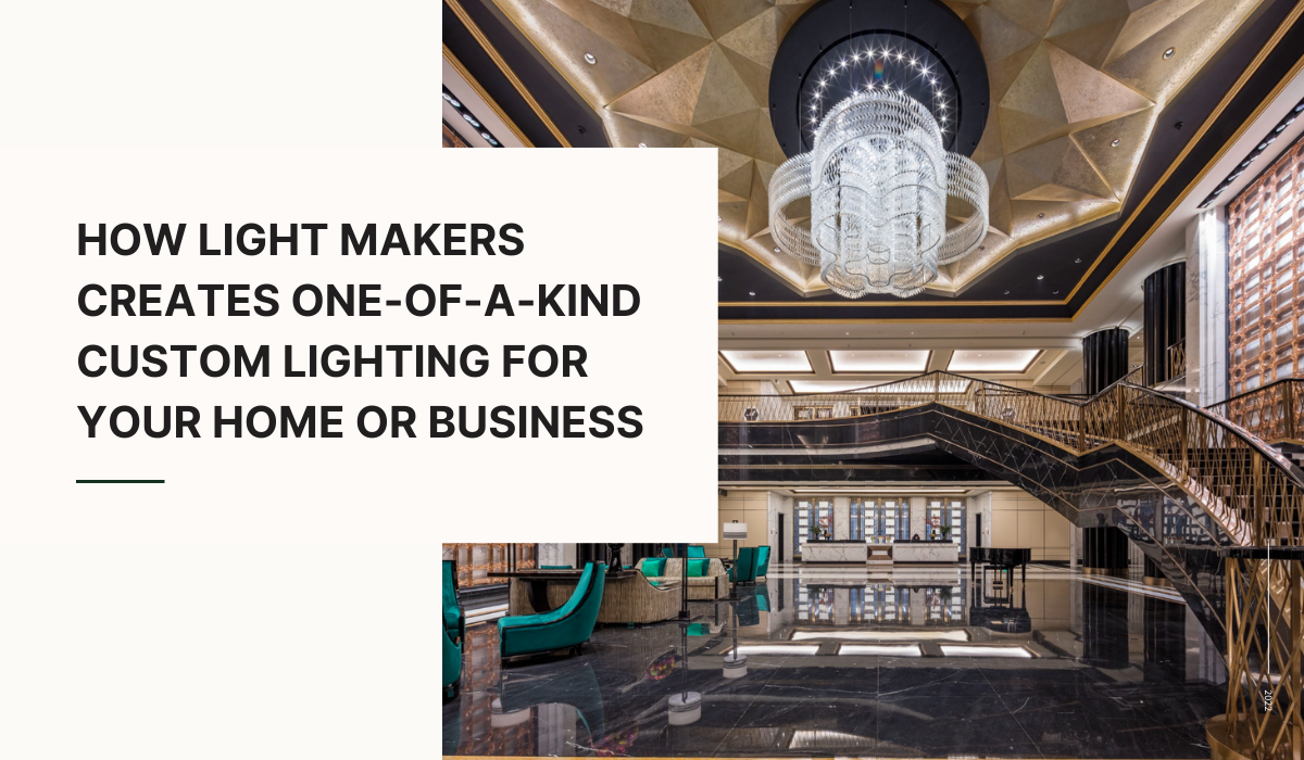Luxury hotel lobby with a grand custom chandelier, showcasing bespoke lighting design.